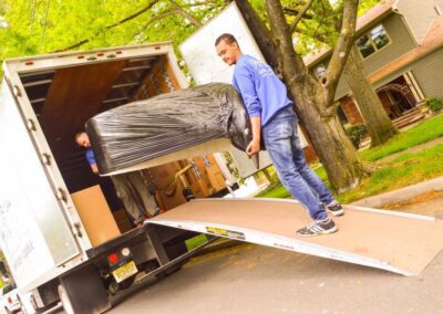 Pictured: An Absolute Moving System employee loading a moving truck.
