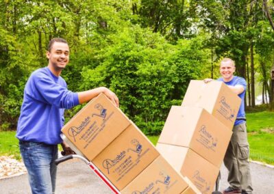 This is an image of two professional movers of Absolute Moving System.