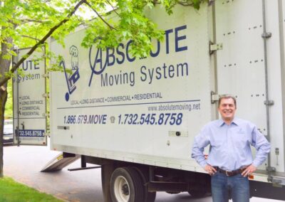 Pictured: Absolute Moving System CEO Oleg Kouznetsov with moving truck.